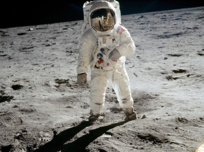 astronaut walking on the moon