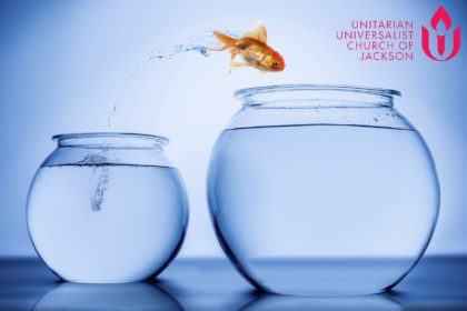 goldfish leaping from smaller fishbowl to larger fishbowl